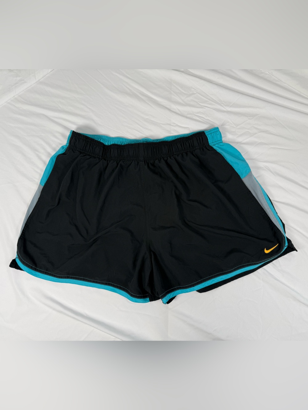 Women’s Nike Black and Aqua Running Shorts